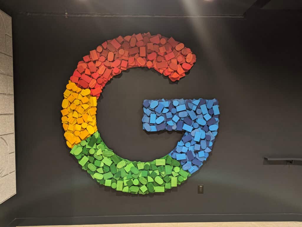 Google logo on an office wall.